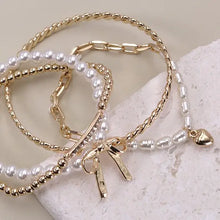 Load image into Gallery viewer, Bow Pearl Bangle Set
